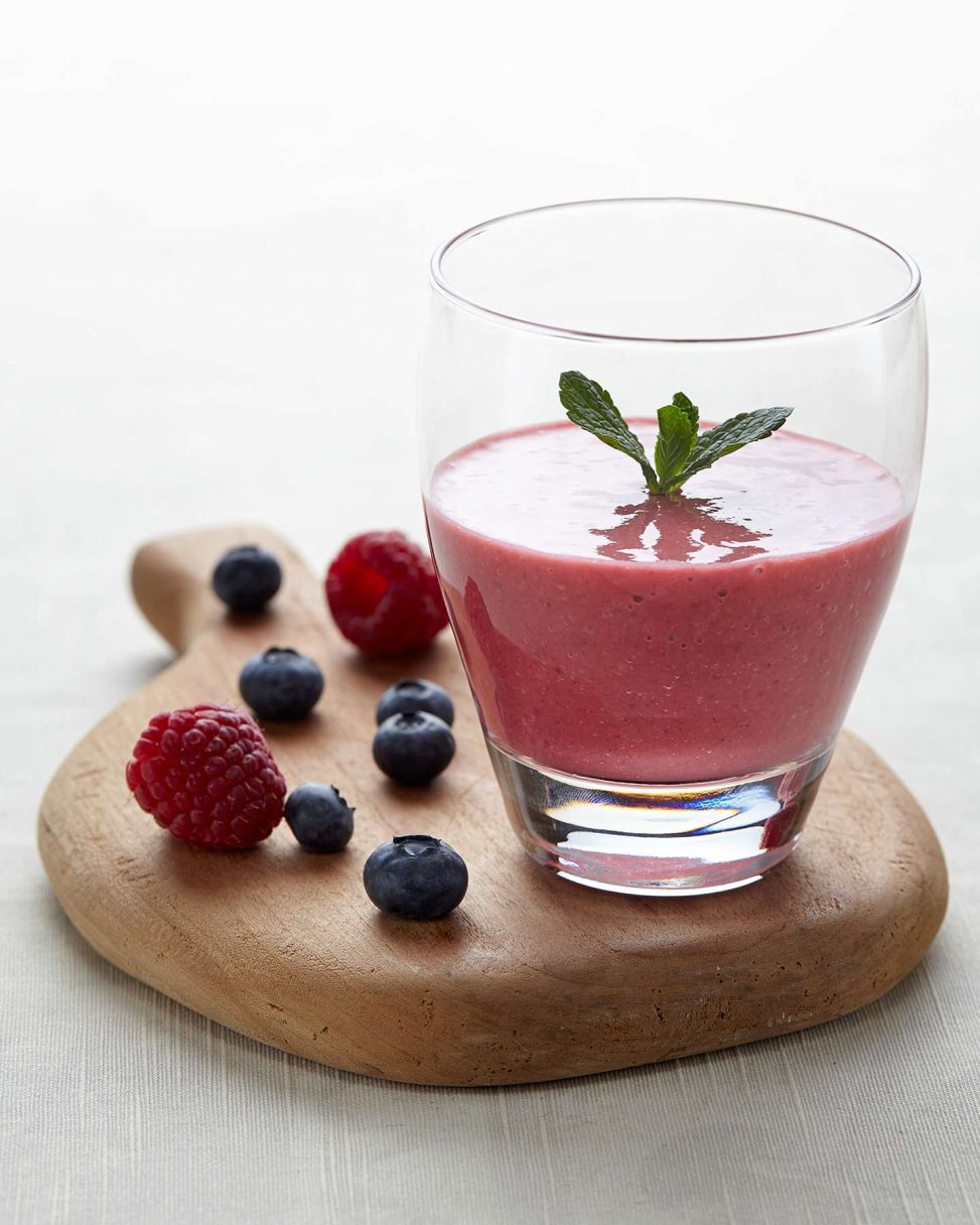 Smoothie in a glass with fresh berries
